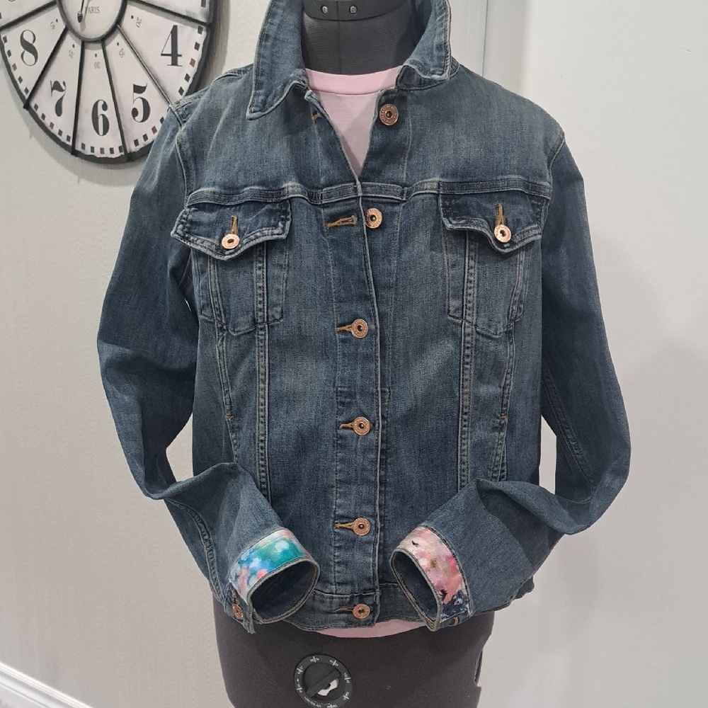 Denim Jacket is recycled with emblellished and colorful cuffs.